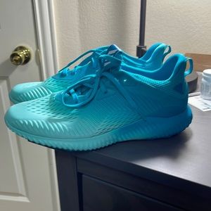 ALPHABOUNCE EM SHOES Size: 9.5
Color: Energy Blue
New Never Worn